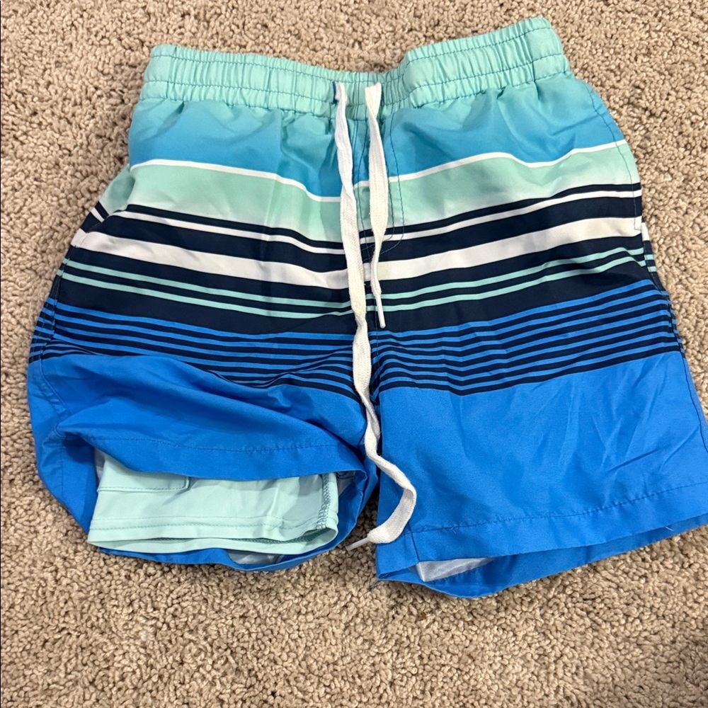 Amazon Essentials Kids Swim Trunks - Blue and Green Stripes with Rash Guard